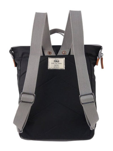 A Roka London Bags Bantry B Small Sustainable Nylon Bag with grey straps.
