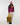Cotopaxi Women's Fuego Down Hooded Jacket in Blackberry and Jam