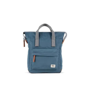 A Roka London Bags sustainable blue Roka Bantry B Small Sustainable Nylon Bag with a brown handle.