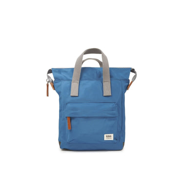 A blue Roka Bantry B Small Sustainable Nylon bag with a brown handle from Roka London Bags.