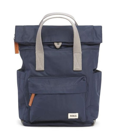 A weather-resistant Roka Canfield B Backpack (Nylon) - Small with grey handles and straps by Roka London Bags.