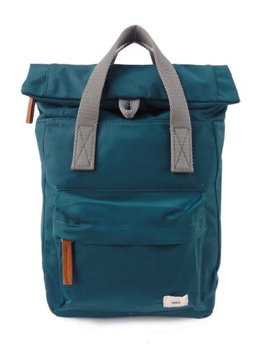 A weather-resistant Roka Canfield B backpack with grey handles and straps.