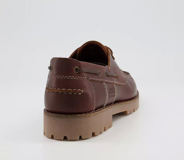 A Barbour Stern Boat Shoes - Mahogany in brown with a white background.