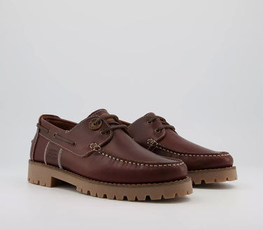 A pair of Barbour Stern Boat Shoes in Mahogany leather with lacing details.