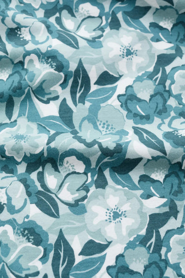 A close-up of a fabric with flowers made of Seasalt Anchor Hold Jersey Top.