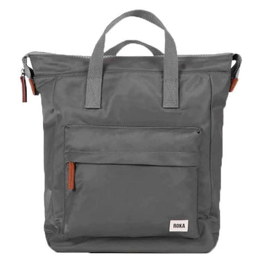 A weather resistant Roka Bantry B Small Sustainable Nylon Bag in grey with two straps and a shoulder strap by Roka London Bags.